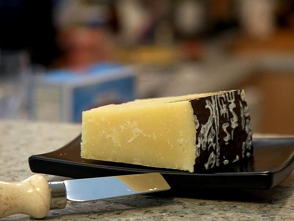 A slice of Pecorino Romano cheese